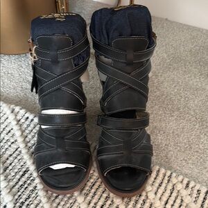 Freebird Black Heeled Boots with Edgy Design